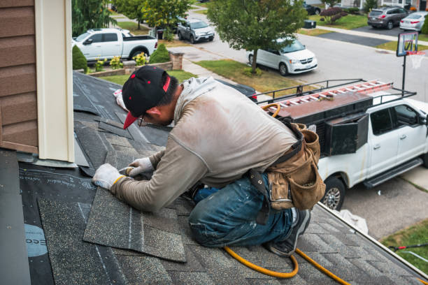 Professional Flat Roof Repair technician working in Dunnsville, VA